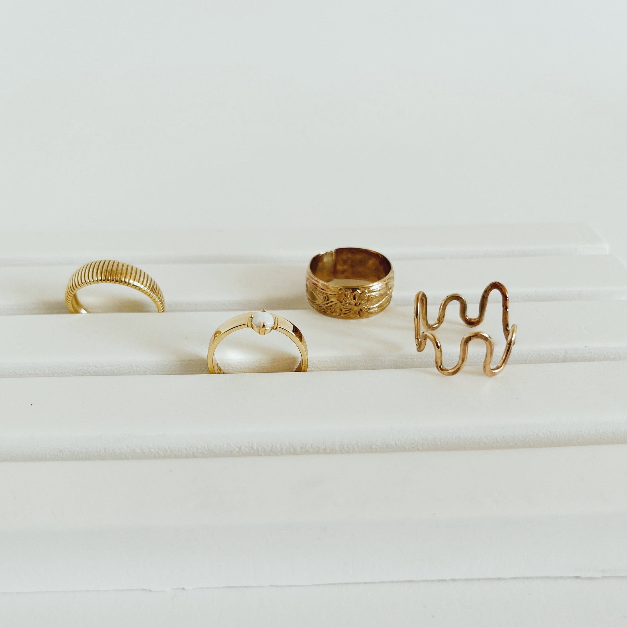 bryce ring with three other rings from our collection.