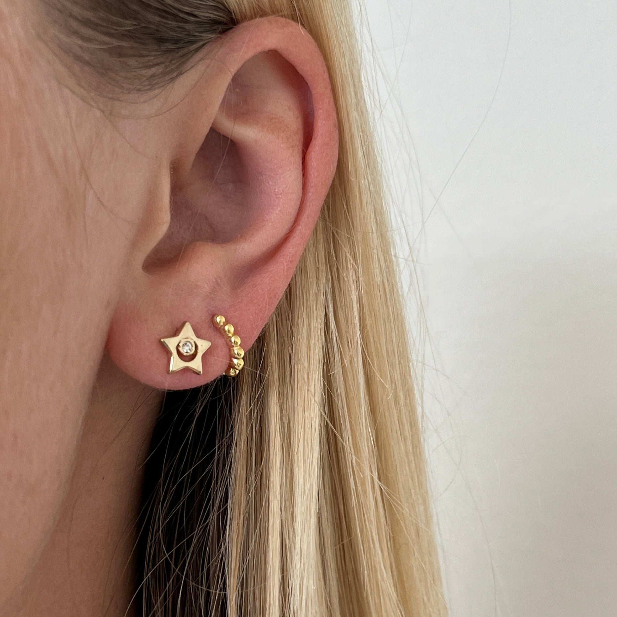 star shaped earrings.
