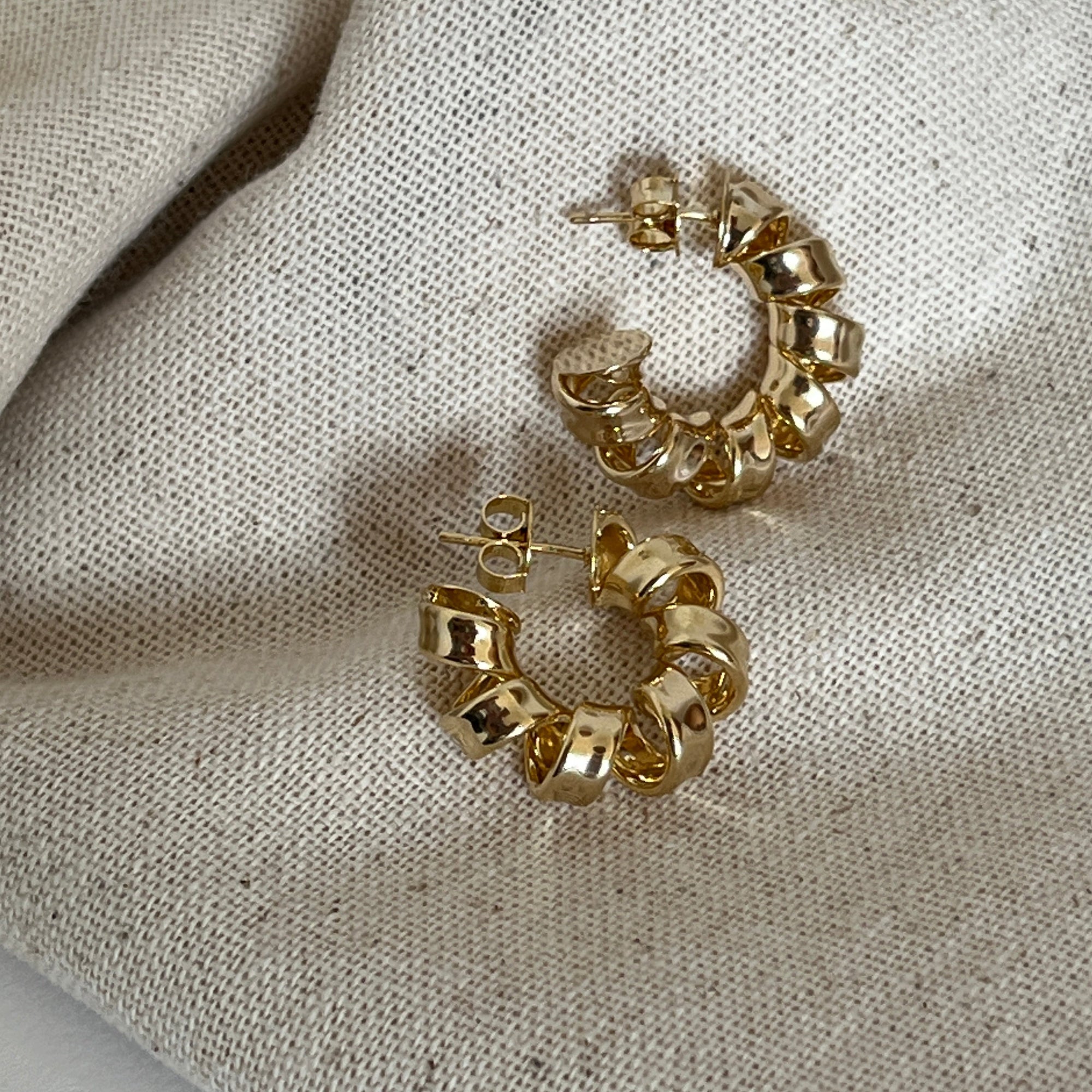 gold filled spiral hoops in small. 