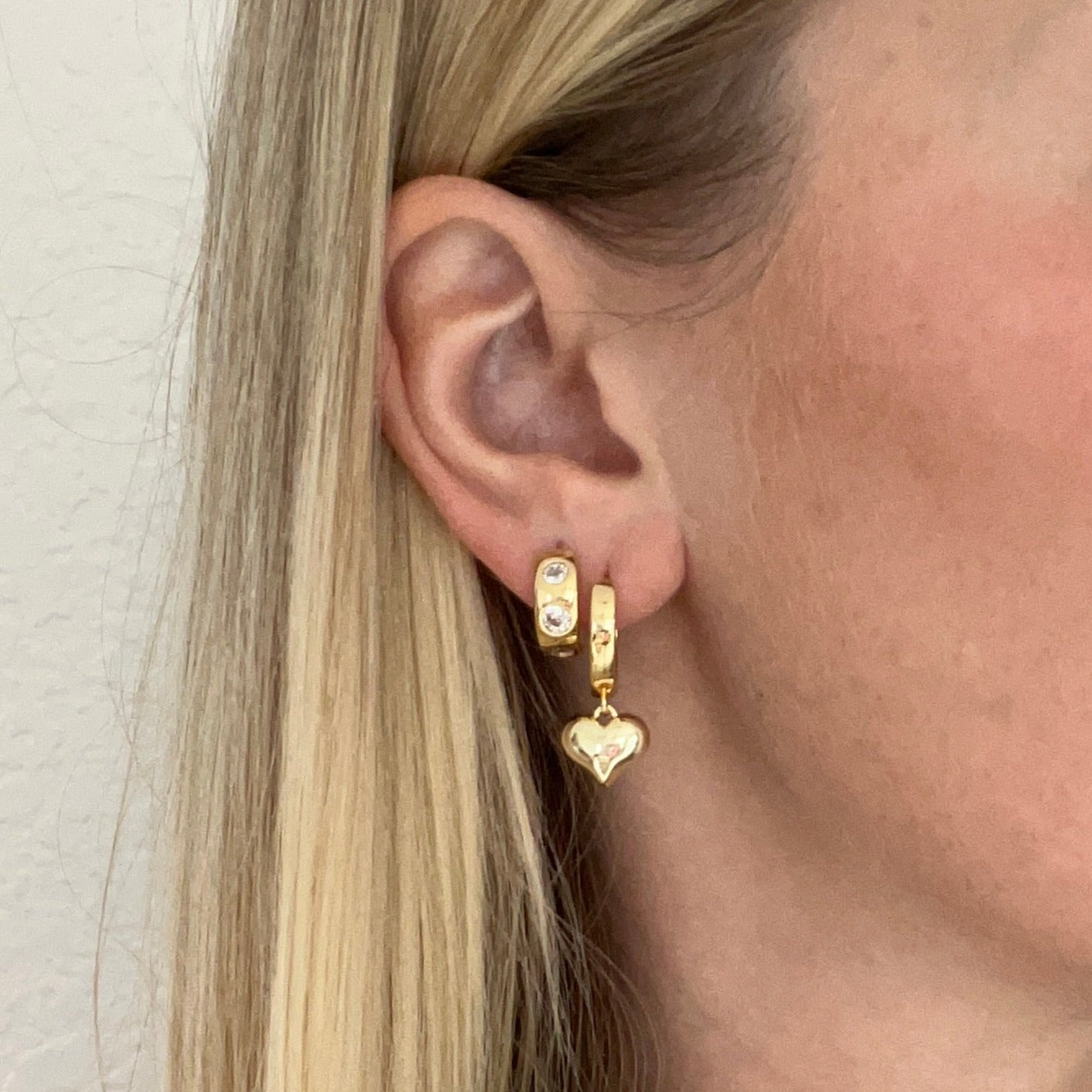 Every gold hoops on model. 