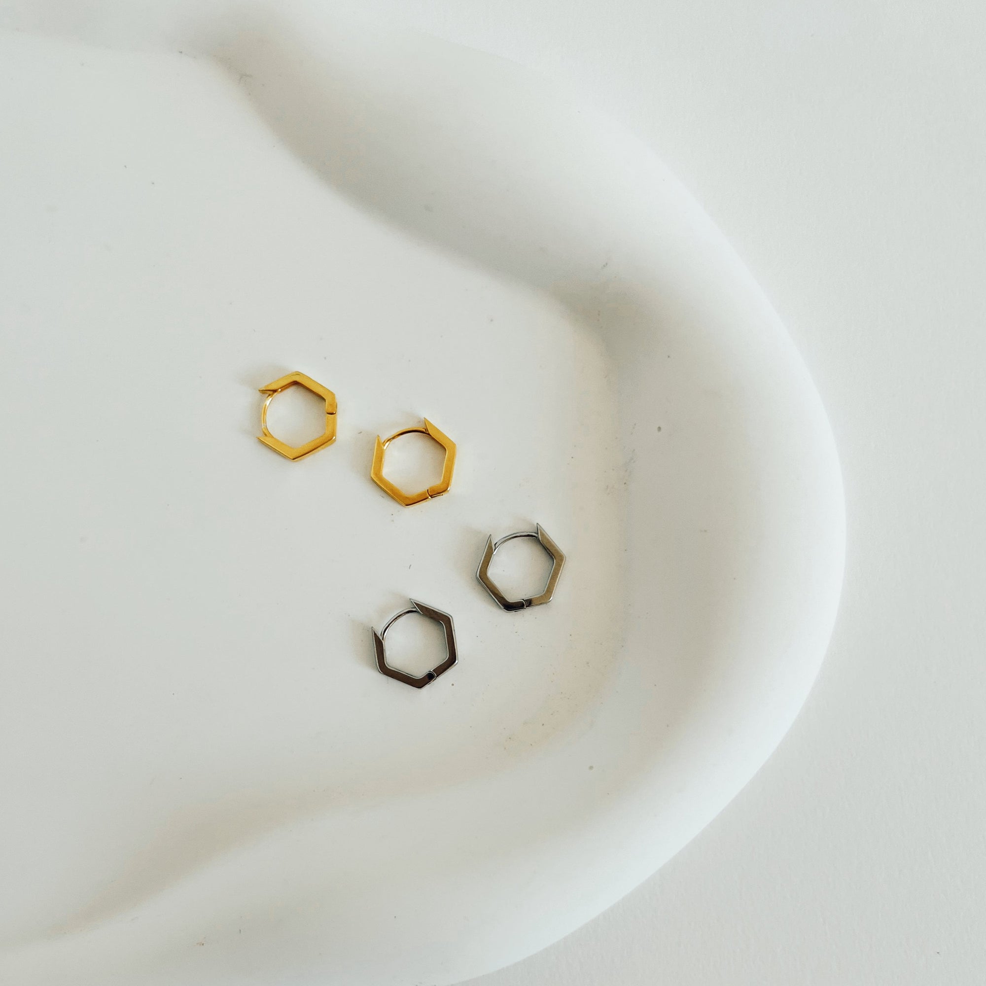 silver and gold zoey hoops.