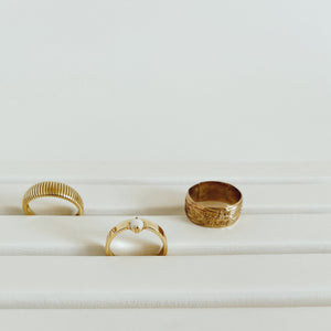 Flora thick ring band with our armadillo and opal ring. 